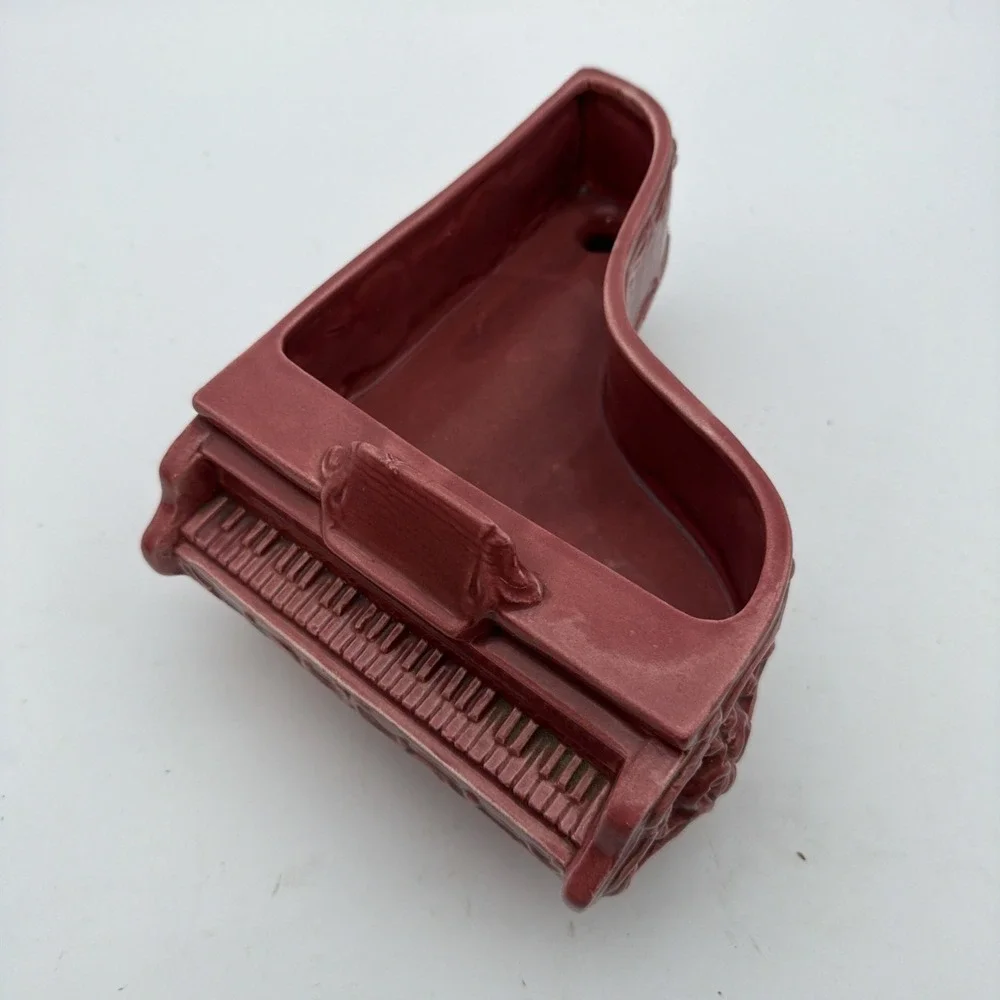 vintage ceramic baby grand piano planter in a dusty rose